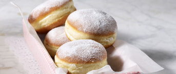 Berliner in einer Schachtel Boules de Berlin dans une boîte